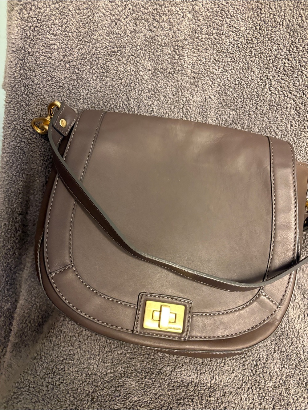 Brahmin taupe shoulder saddle bag with gold hardware